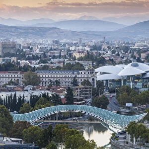 Georgia, Tbilisi, View of city looking towards Peace bridge, Rike Park, and The Public