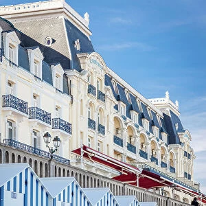 Historic Grand Hotel and changing rooms in Cabourg on the beach, Calvados, Normandy, France