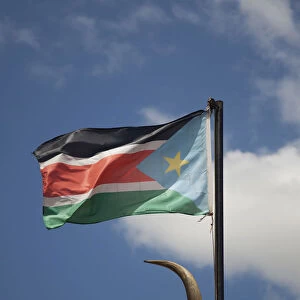 Juba, South Sudan. The South Sudanese Flag flying at the mausoleum of John Garang