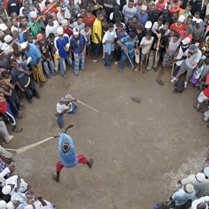 Lamu crowds watch a stick fight along the waterfront at Lamu town
