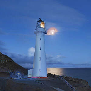 Lighthouse and full moon - New Zealand, North Island, Wellington, Masterton, Castlepoint