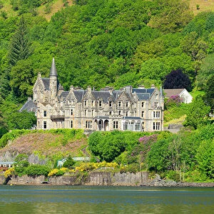 Loch Awe Hotel on shore of Loch Awe on sunny day, Argyll And Bute, Scotland, UK