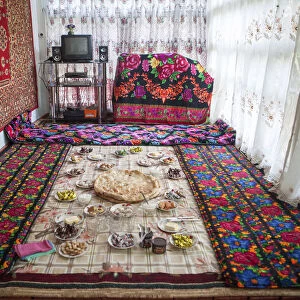 Lunch laid out on a tablecloth on the floor, at a homestay on the Pamir Highway