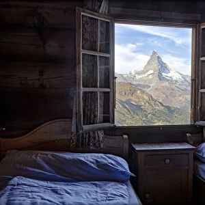 Majestic Matterhorn peak seen from bedroom window of Fluhalp hut hotel, Zermatt