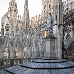Milan, Lombardy, Italy One of the many statues on the rooftop of Milan Cathedral