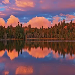 Morning clouds reflected in Crozier Lake in Algoma District North of Lake Superior Provincial Park, Ontario, Canada