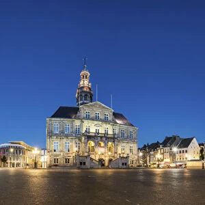 Netherlands, Limburg, Mstricht. Stadhuis city hall on Markt square at dusk