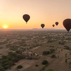Old temple in Bagan and hot-air balloons at sunrise, UNESCO, Old Bagan, Mandalay Region
