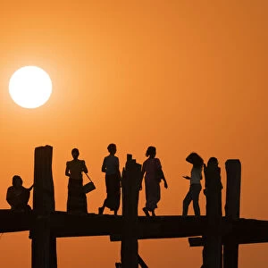 People on U Bein bridge over Taungthaman Lake at sunset, Amarapura, Amarapura Township
