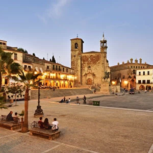 The Plaza Mayor in the evening with San Martin church. Trujillo, Spain