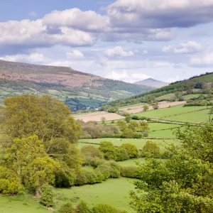 Rolling countryside near Bwlch with views to Sugar Loaf mountain, Brecon Beacons National