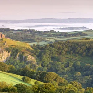 Ruins of Carreg Cennen Castle at dawn in the summer, Brecon Beacons, Carmarthenshire