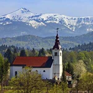 Slovenian Church with Mountain backdrop