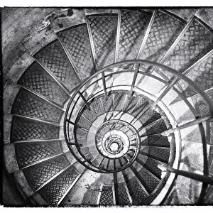 A spiral staircase inside Arc de Triomphe, Paris, France