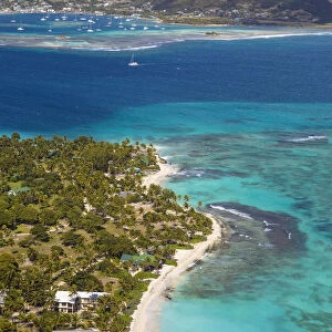 St Vincent and The Grenadines, View of Palm Island, with Union Island in distance