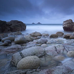 Stormy evening at Porth Nanven in Cornwall, England. Winter (December)