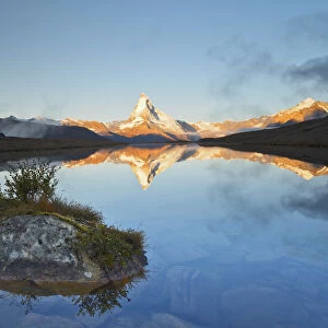 Switzerland, Valais, The Summit of the Matterhorn reflected in Stellisee during a