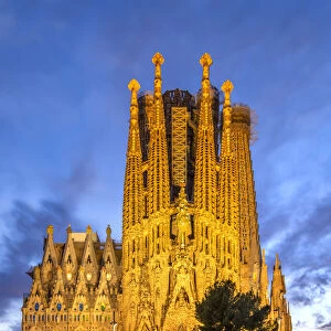 Twilight view over Nativity facade, Sagrada Familia basilica church, Barcelona, Catalonia