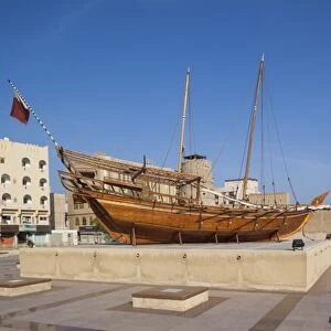 UAE, Dubai, Bur Dubai, Dubai Museum, exterior with traditional Dhow ship