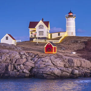 USA, Maine, York Beach, Nubble Light lighthouse, dusk