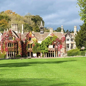 View towards The Manor House, 14th century building set in 365 acres of secluded parkland in the Cotswold village Castle Combe, Wiltshire, Cotswolds, England