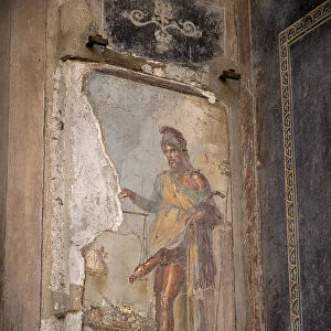 A fresco on a wall in the House of the Vettii Priapus admiring himself