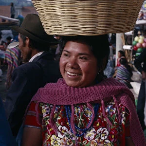 GUATEMALA, Chimaltenango, Patzun Kaqchiquel Indian woman named Modesta smiling wearing