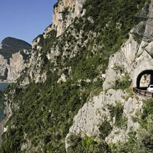 Italy, Lombardy, Lake Garda, Tremosine, tunnel & road climbing to village of Pieve