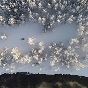 An aerial view shows a car driving along a bank of the Yenisei River outside Krasnoyarsk