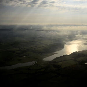 Aerial view of sun rays at dawn above Dublin