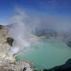 A general view of Kawah Ijen volcanic crater and the sulphur mines located at its foot