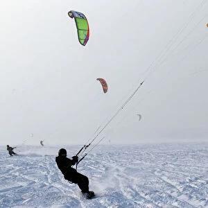 Kite surfers take advantage of the frozen Puck Bay in Chalupy