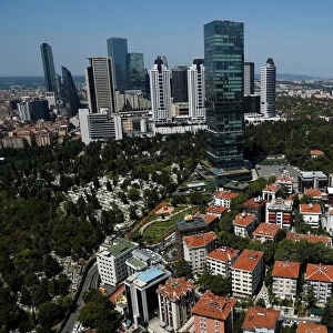 Skyscrapers of banks headquarters and popular shopping malls are pictured next to