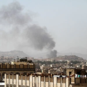 Smoke rises after an airstrike in Sanaa