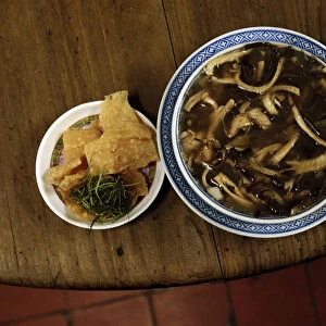 Snake meat is seen in a bowl of snake soup served at a snake soup shop in Hong Kong