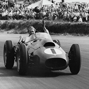 Peter Collins lap of honour after winning the 1958 British GP for Ferrari