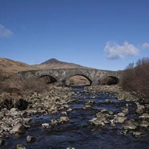 Bridge over the Corran River with one of the Paps of Jura behind. Isle of Jura Scotland