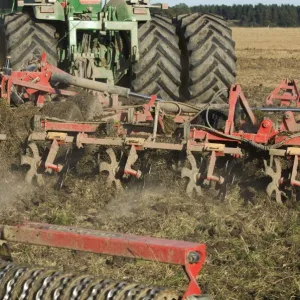 John Deere 9400 tractor, harrowing stubble field, Sweden