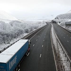 Lorry on motorway in snow, M6 Motorway, Tebay Gap, Cumbria, England, december