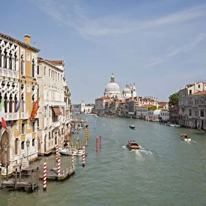 View of canal and Roman Catholic church, looking from Accademia Bridge at San Marco waterfront