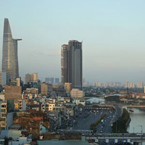 Apartments, Bitexco Financial Tower, high rise buildings, and Ben Nghe River, Ho Chi Minh City