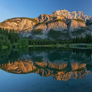 Canada, Alberta, Banff National Park. Cascade Mountain reflected in Cascade Pond at sunrise