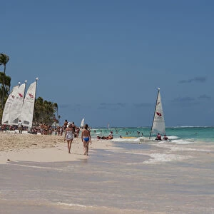 Dominican Republic, Punta Cana, Higuey, Bavaro, Bavaro Beach, people and sailboats