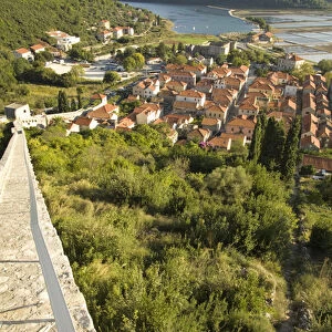 Europe, Croatia, Dalmatia, Mali Ston. Salt pans, lush hills and village of Mali Ston