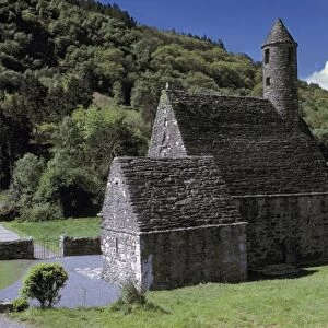 Europe, Ireland, Glendalough. The small, stone-cobbled Saint Kevins Church is