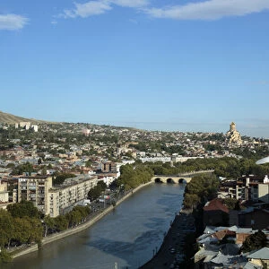 Georgia, Tbilisi. A view from above of downtown Tbilisi and the Mtkvari river, with
