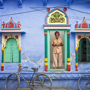 India, Rajasthan, spiritual man in doorway. Credit as: Jim Nilsen / Jaynes Gallery / DanitaDelimont