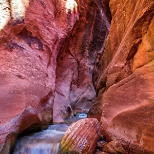 Kanarraville, Utah. Hiking through the red rock slot canyons in Kanarraville, Utah