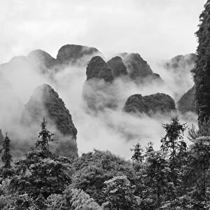 Limestone hills in mist, Yangshuo, Guangxi, China