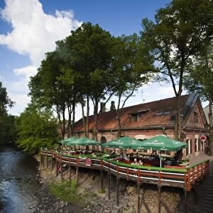 Lithuania, Vilnius, Uzupis Area, Bohemian Vilnius, Republic of Uzupis riverfront cafes